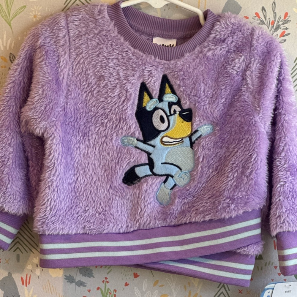 NWT 12 Month Size Super Plush Purple Fuzzy Bluey Pullover w/ Criss Cross Band